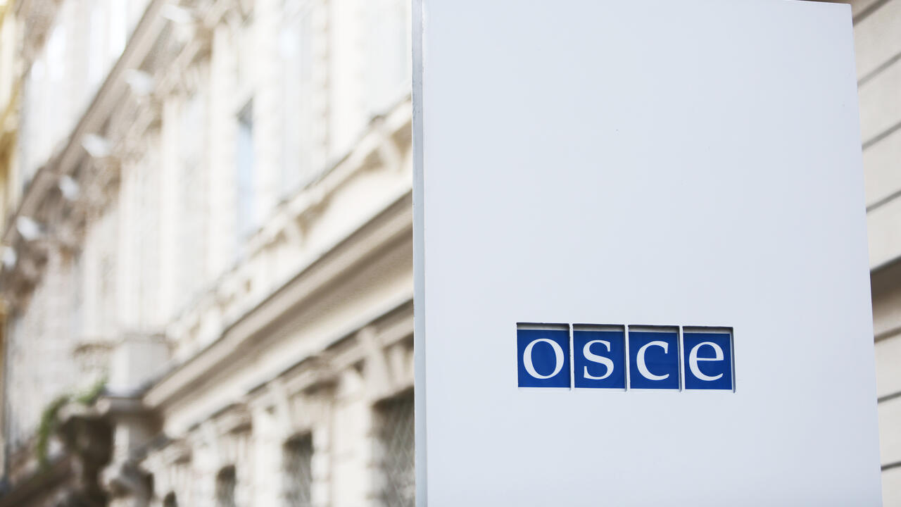 OSCE sign in front of secretariat entrance